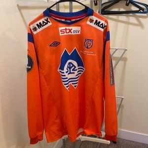 Umbro Norwegian soccer jersey. Color is Orange and Blue